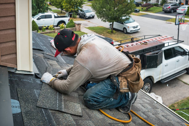 Professional Flat Roof Repair technician working in Mesick, MI